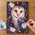Hands placing drills on the Barn Owl Indigo Thistle Frame diamond painting canvas