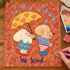 Diamond painting process image showing the two poodle friends and umbrella artwork being completed with a stylus