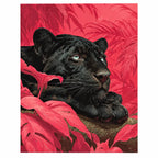 Original artwork showing a black panther reclining among vivid coral leaves.