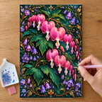 Hands placing drills on the Bleeding Heart Velvet Vine diamond painting canvas