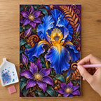 Hands placing drills on the Blue Iris Copper Fern Frame diamond painting canvas