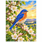 Finished bluebird among apple blossoms diamond painting on a white background