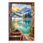 Finished diamond painting of a boat and mountain lake framed by a boathouse on a white background.