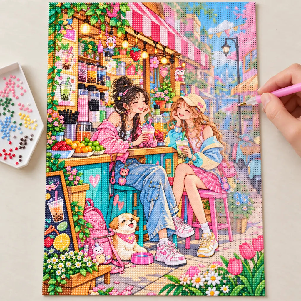 Hands placing diamond drills on the bubble tea friends canvas