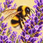 Close-up diamond drill detail on the bumblebee and purple lavender blossoms