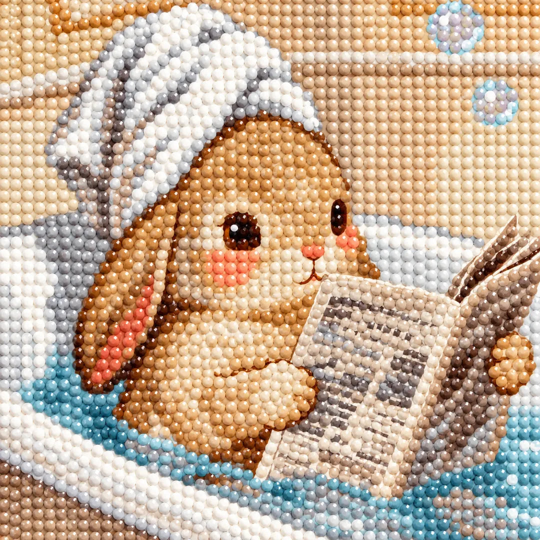 Close-up diamond drill detail of the bunny reading in a bathtub