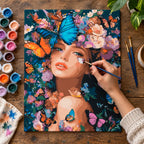 Complete Butterfly Muse Floral Portrait numbered canvas being painted with acrylic paints and brushes