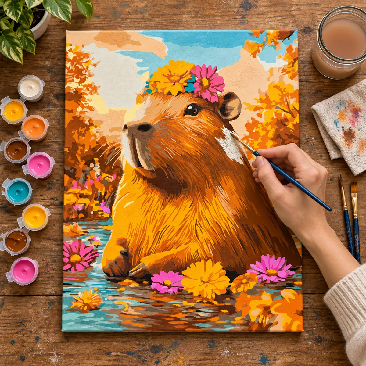 Complete Capybara in Autumn Flowers numbered canvas being painted with acrylic paints and brushes