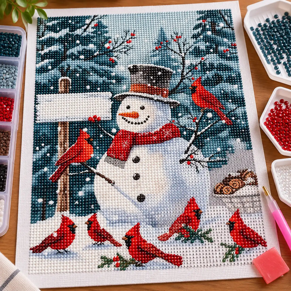 Diamond painting process for Cardinals Around The Snowman