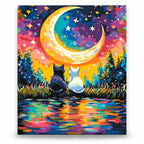 Cats beneath Colorful Crescent Moon paint by numbers artwork on a front-facing canvas against a white background