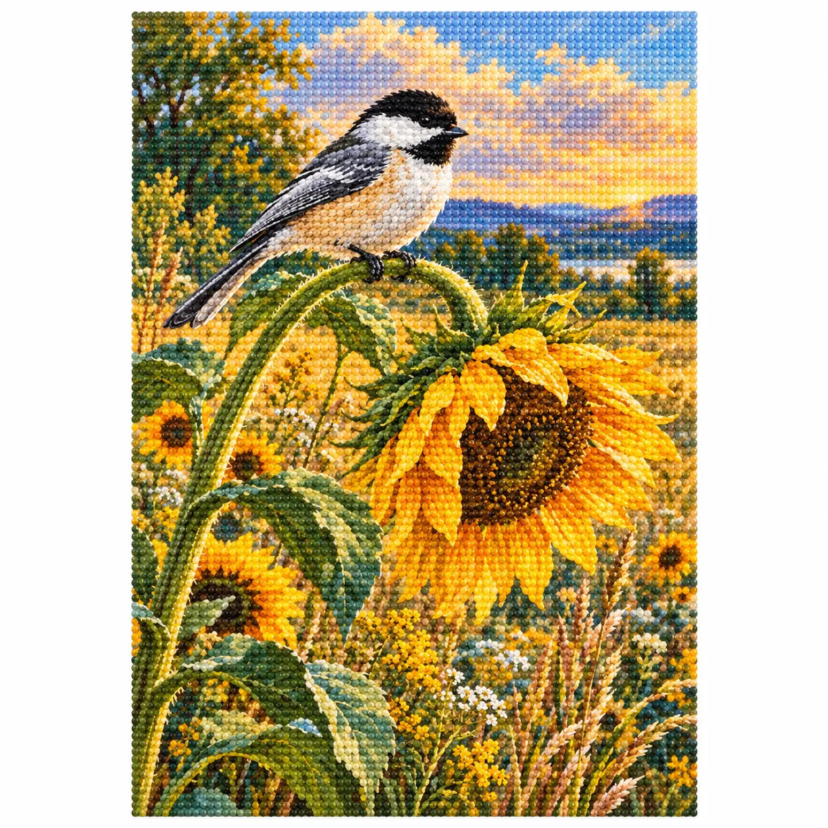 Finished chickadee and sunflower diamond painting on a white background