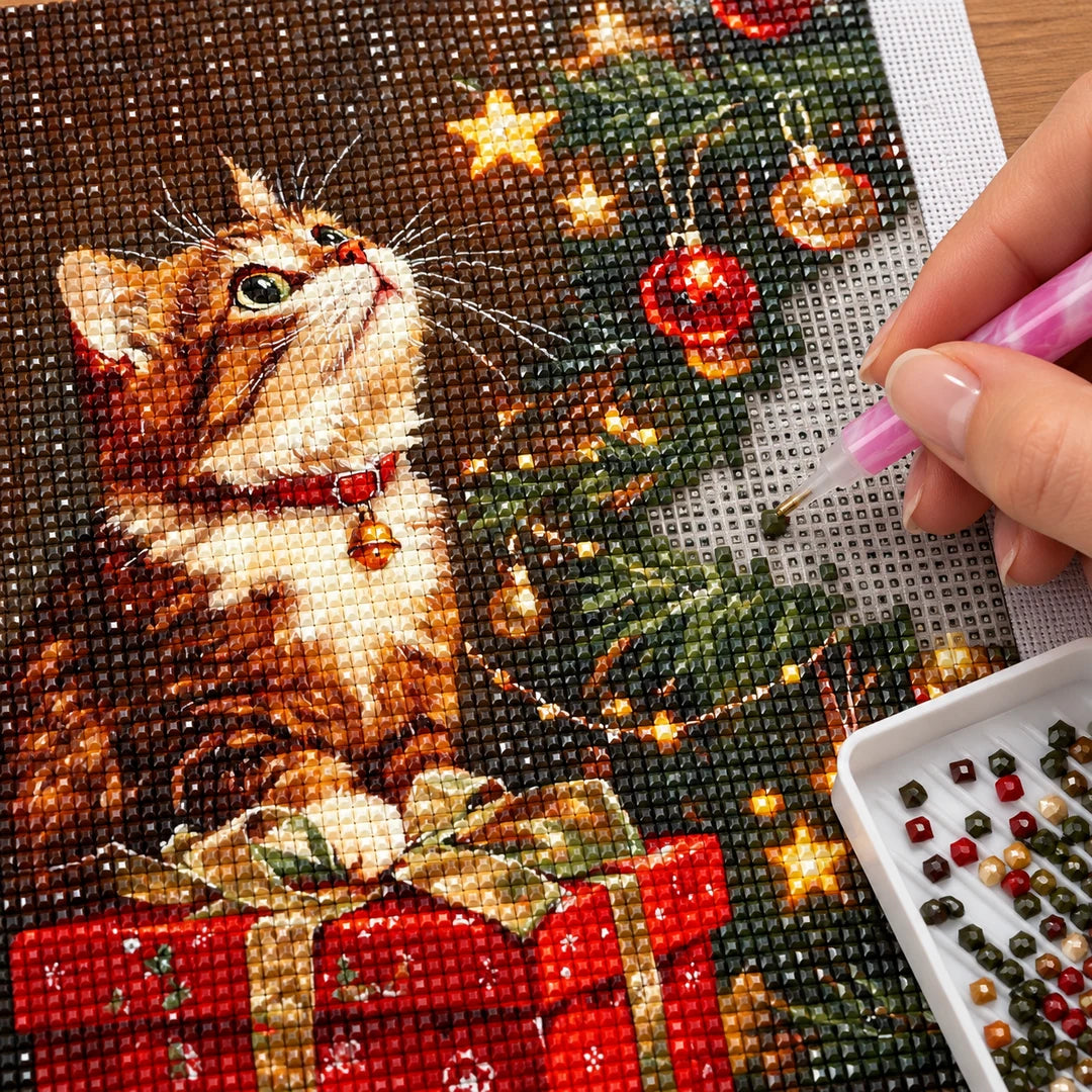 cat beside a Christmas tree diamond painting process