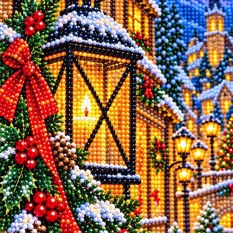 Close-up diamond drill detail of the glowing lantern and snowy village