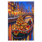 Finished diamond painting of a decorated Christmas tree on a canal barge beneath an illuminated stone bridge