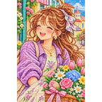 Close-up of faceted drills forming a bicycling florist delivering bouquets through a colorful city street