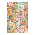 Original white-background artwork of a bicycling florist delivering bouquets through a colorful city street