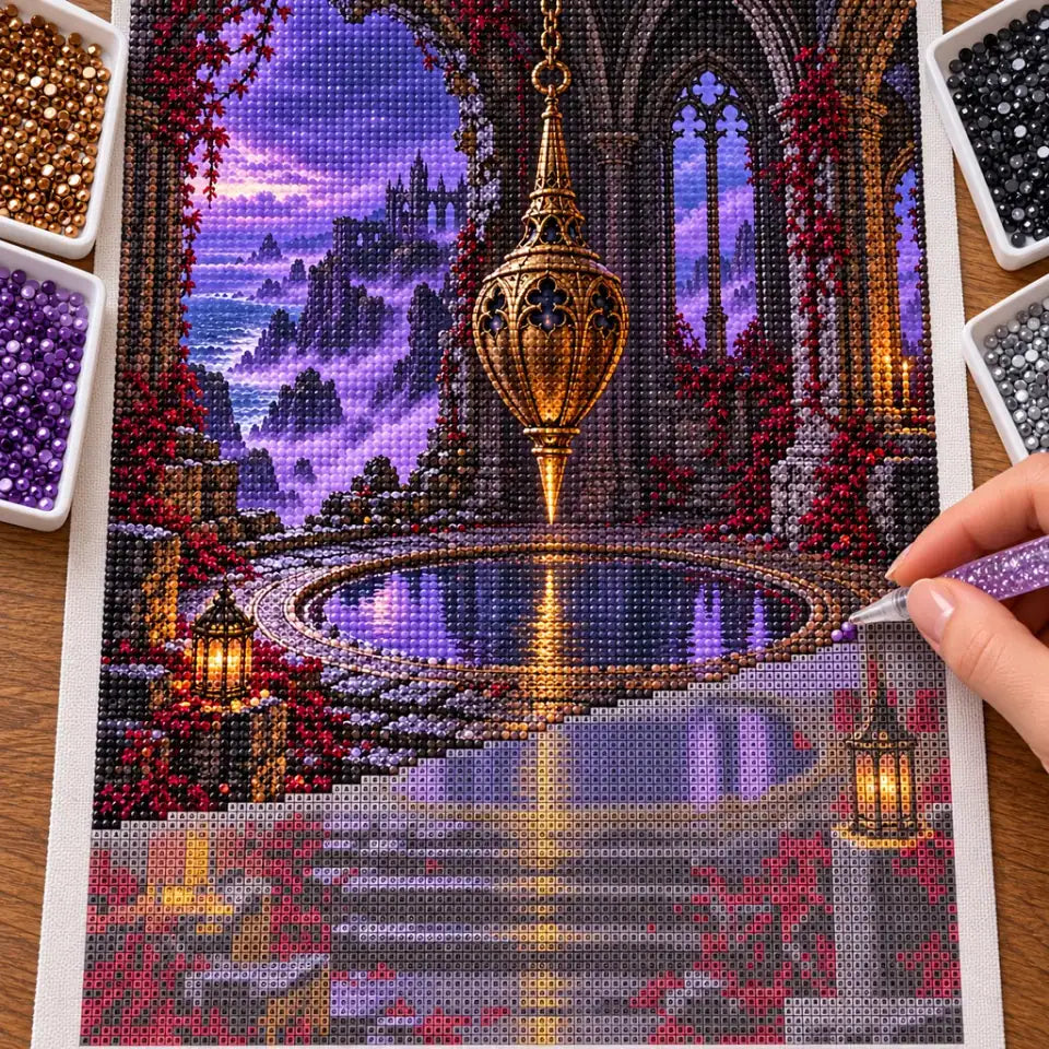 Hand placing diamond drills on the cliff pendulum hall canvas