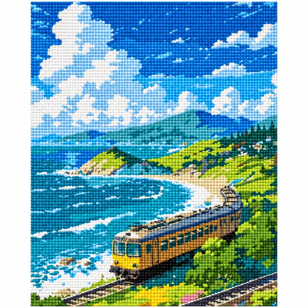 Finished diamond painting for Coastal Curve Diamond Painting Kit, showing a yellow train winding beside turquoise surf and green coastal cliffs.
