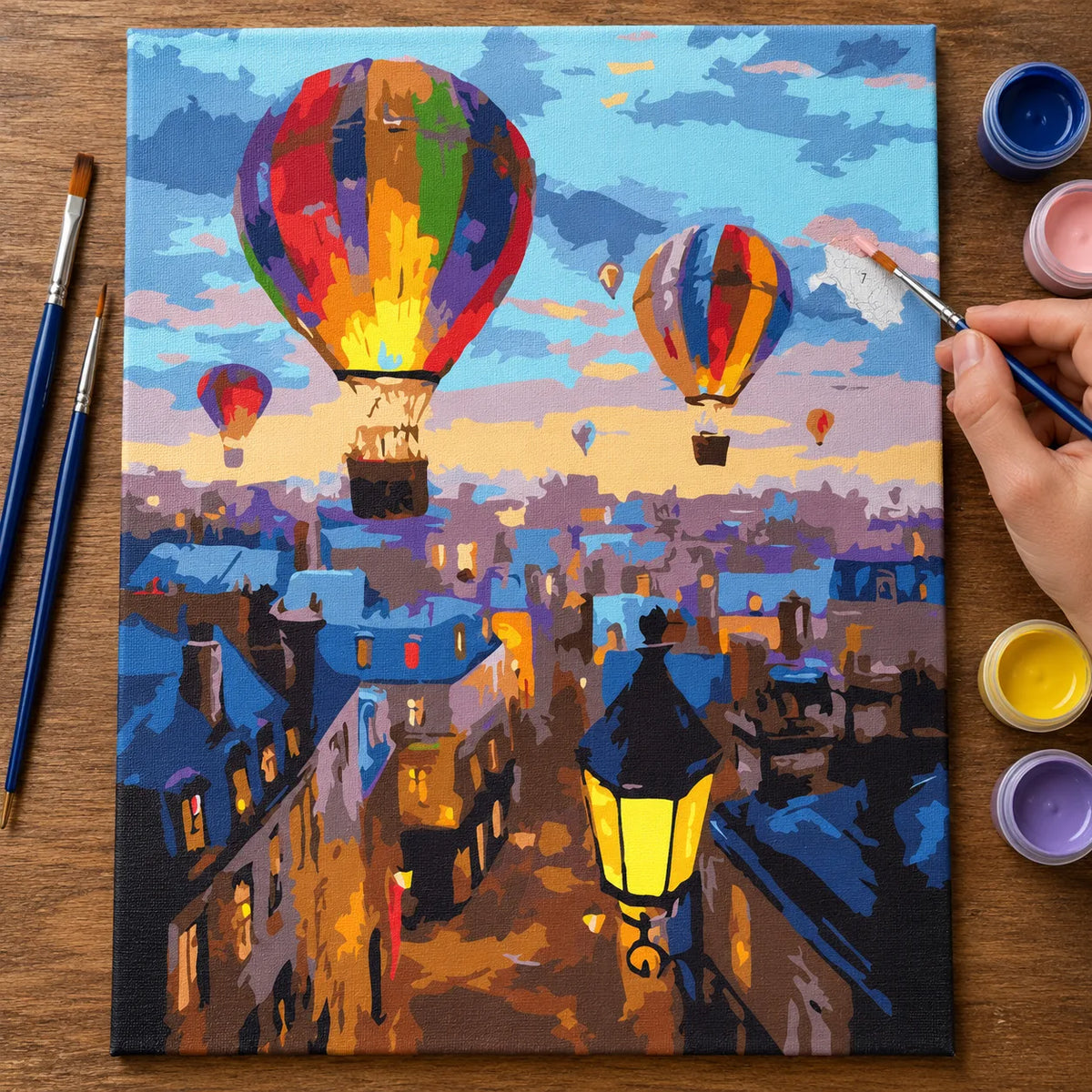 Complete Colorful Balloons over City Rooftops numbered canvas being painted with acrylic paints and brushes