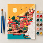Complete Colorful Coastal Village at Sunset numbered canvas being painted with acrylic paints and brushes