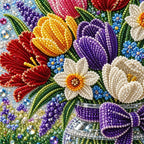 Close-up of glossy pearl beads forming colorful tulips and flowers in the design.
