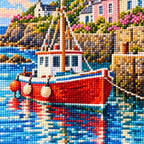 Close-up of faceted drills on a red harbor boat with the coastal village behind it.