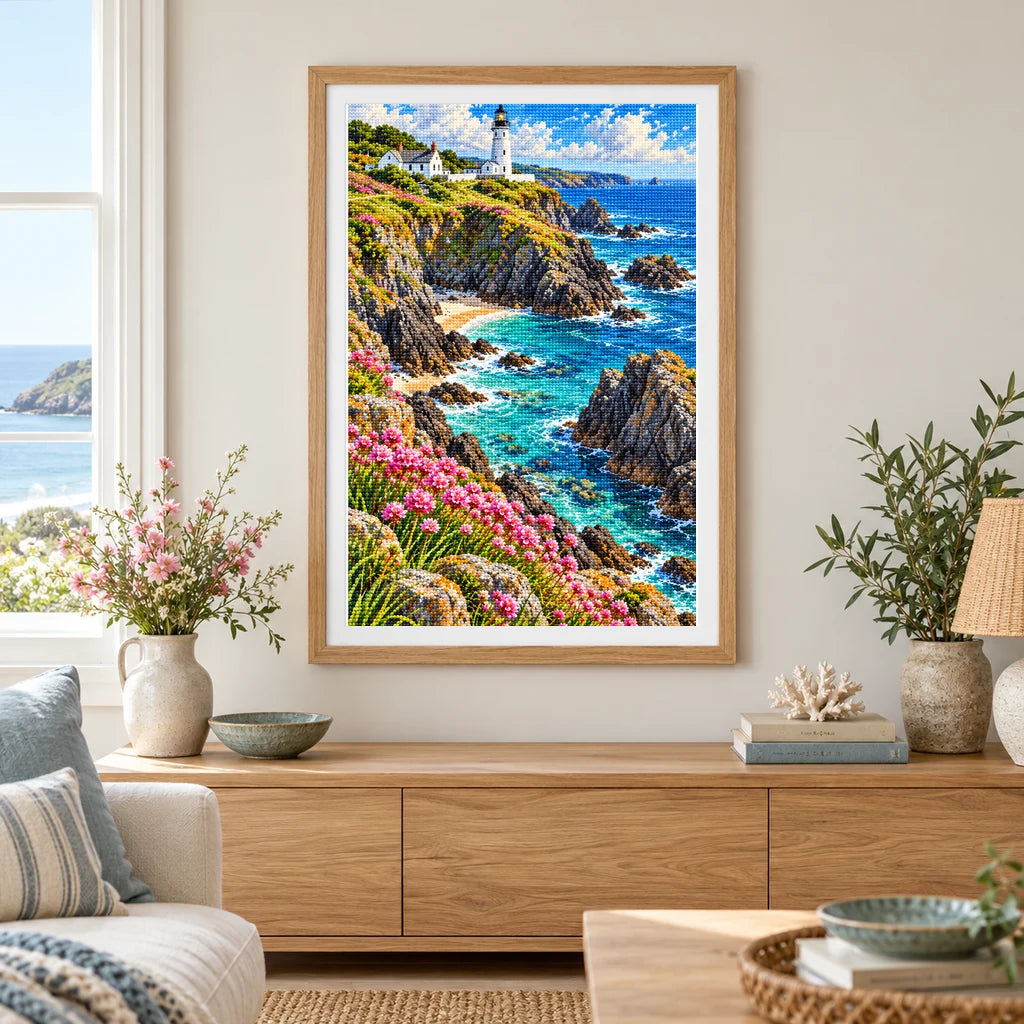 Framed Cornwall lighthouse diamond painting displayed in a bright coastal home interior