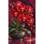 Deep red orchids against a dark velvet background: finished diamond painting on a white background