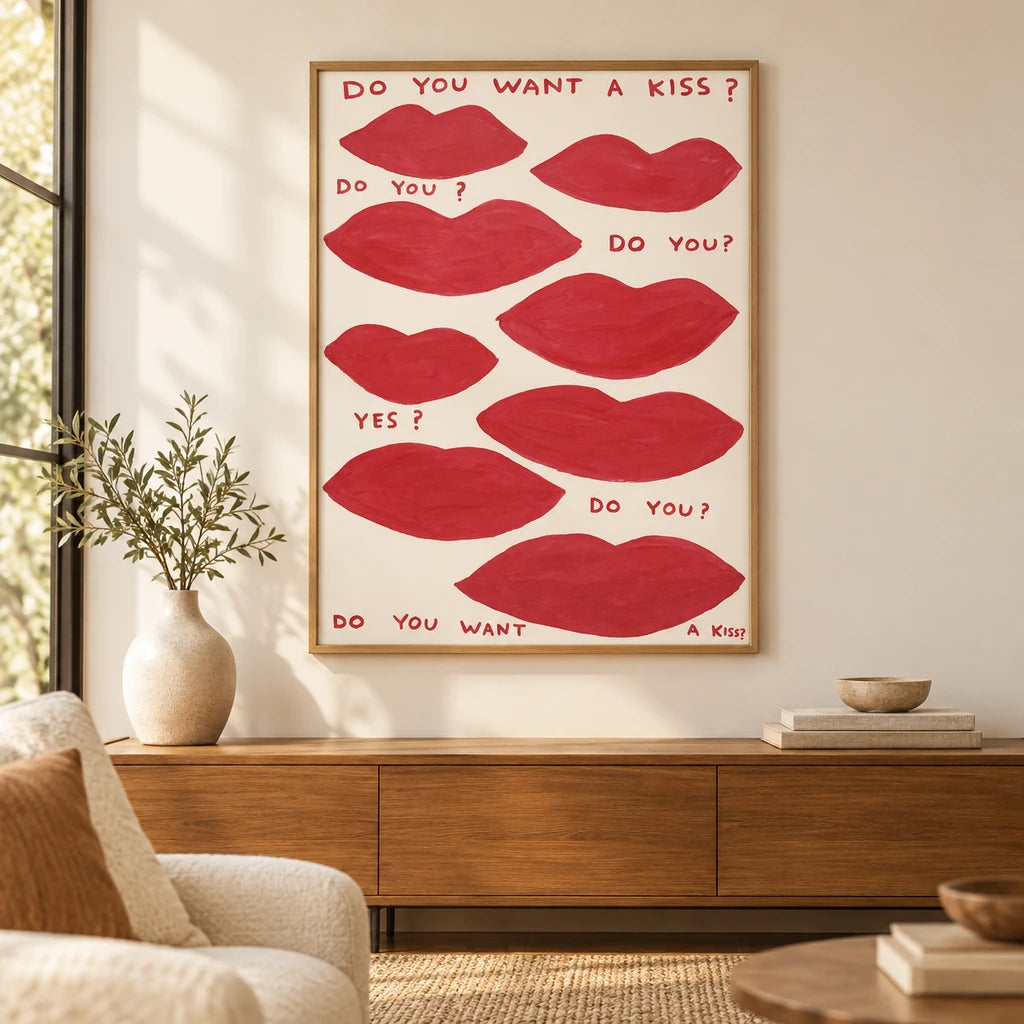 Home decor scene showing playful red lip motifs with a kiss message displayed on a wall.