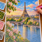 Hands placing diamond drills on the Eiffel Tower Morning design.