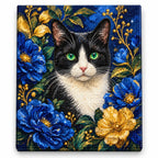 Finished diamond painting of a black-and-white cat with green eyes among blue and golden blossoms
