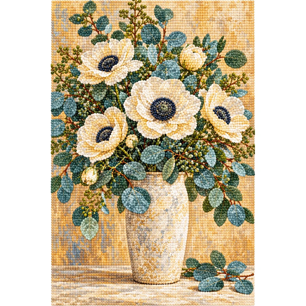 White blossoms and eucalyptus leaves in a silver vase: finished diamond painting on a white background