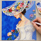 Diamond painting process showing the floral-brim bride portrait being completed with a stylus