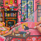 Diamond painting process showing a black cat in a flower-filled living room being completed with a stylus