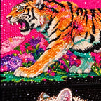 Close-up of diamond drills on artwork of three tigers in pink and coral flowers across a triptych.