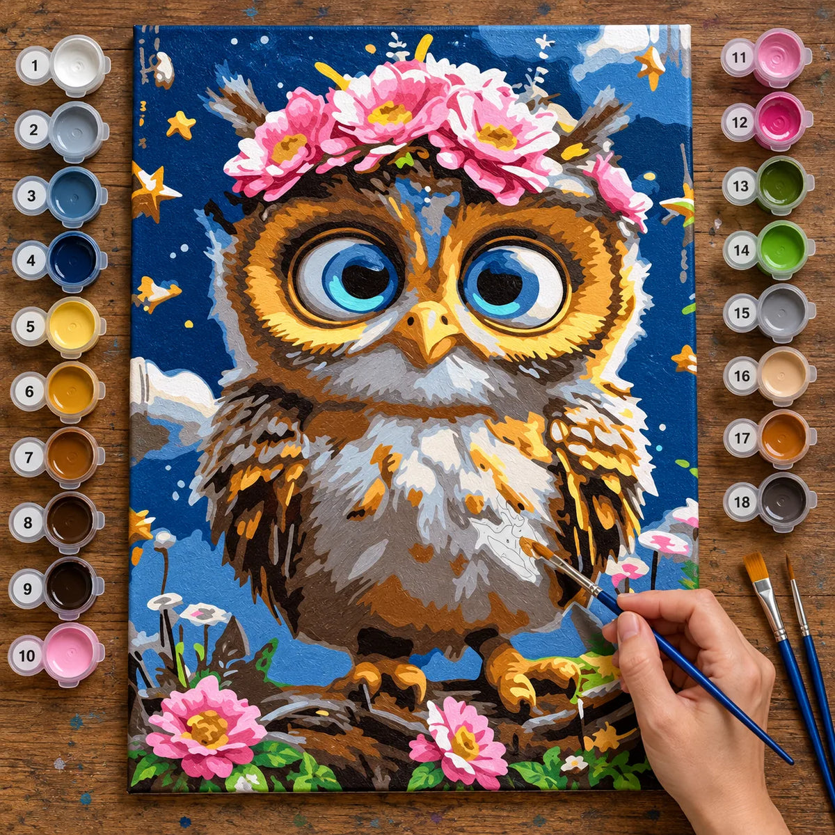 Complete Flower Crown Owl numbered canvas being painted with acrylic paints and brushes