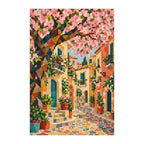 White-background finished diamond painting of a European village lane beneath spring blossoms