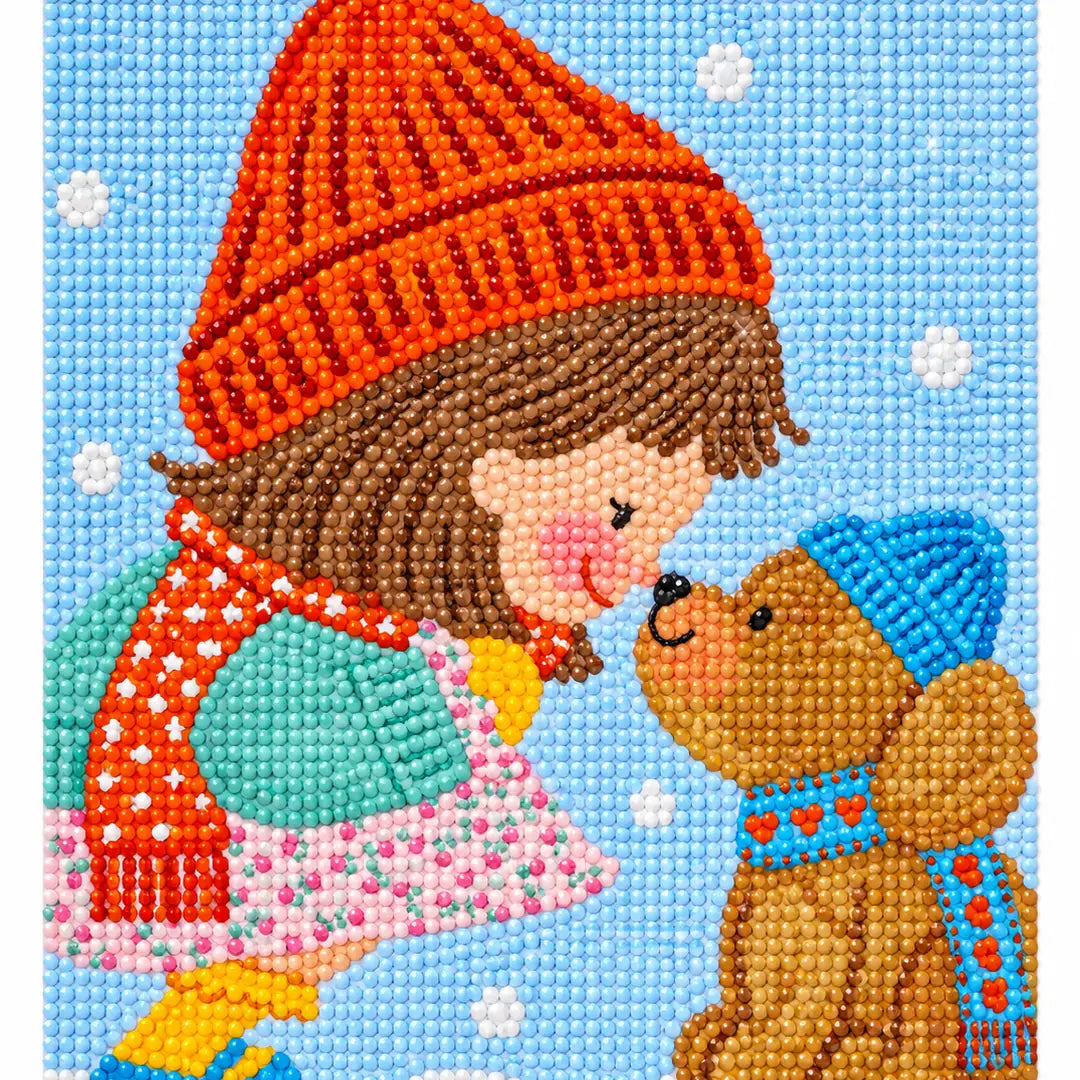 White-background finished diamond painting of a girl and brown bear beneath falling snow