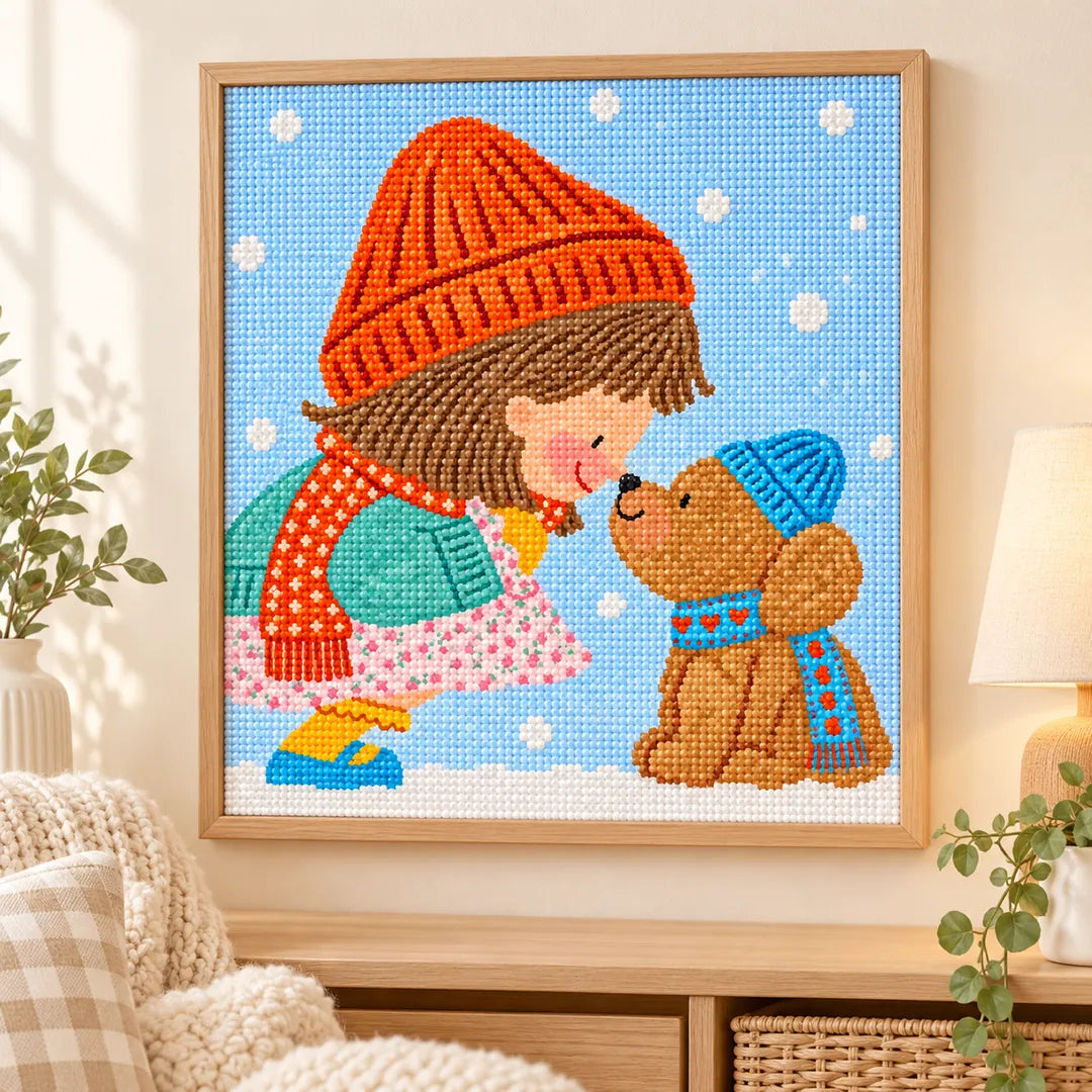 Framed girl and bear in falling snow diamond painting displayed as home decor