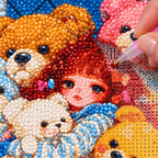 Diamond painting process showing a girl surrounded by teddy bears being completed with a stylus