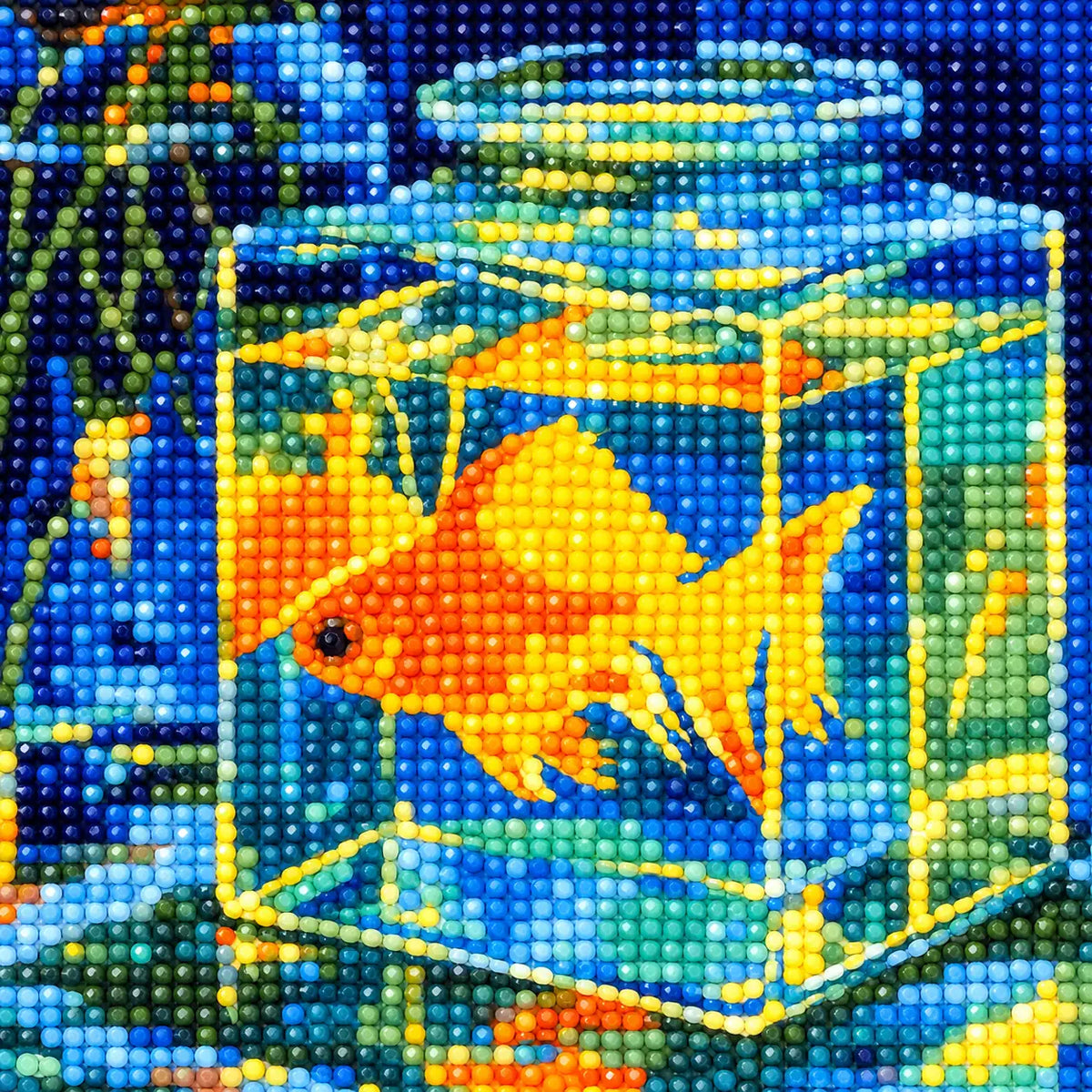 Close-up of diamond drill details in golden glow on blue.