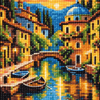 Close-up of drill texture and color in boats and old-town buildings reflected in a golden canal at sunset.