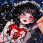 Diamond painting process showing a gothic girl and crimson heart design being completed with a stylus