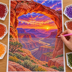 Hand placing diamond drills on the Grand Canyon arch canvas beside trays of drills