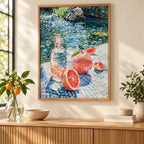 Home decor scene showing a grapefruit picnic scene beside a flowing river displayed on a wall.