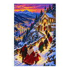 Finished diamond painting of a lantern-lit procession approaching a snowy hilltop chapel