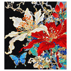 Finished diamond painting of ivory and scarlet flowers with a decorative butterfly.