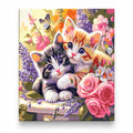 Kittens in Spring Flowers and Butterflies paint by numbers artwork on a front-facing canvas against a white background