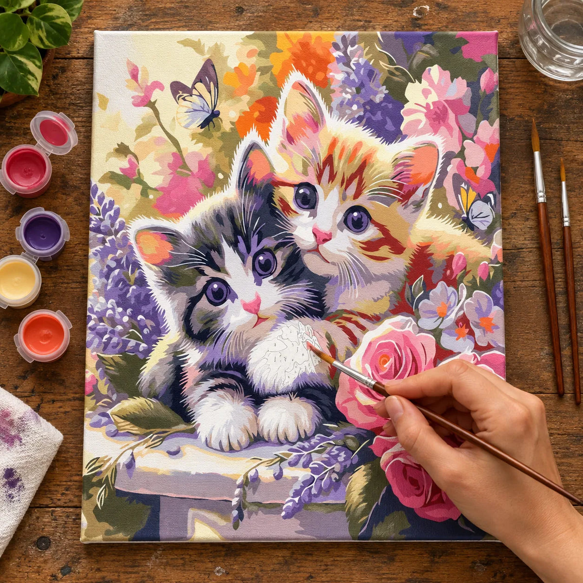 Complete Kittens in Spring Flowers and Butterflies numbered canvas being painted with acrylic paints and brushes