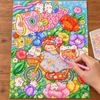 Diamond painting process showing a koinobori garden design being completed with a stylus